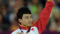 Китайский гимнаст Фэн Чжэ стал чемпионом ОИ в упражнении на брусьях