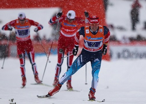 08-12-2013: Максим Вылегжанин на финише победной для россиян эстафеты на этапе КМ в Лиллехаммере