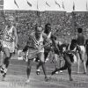 Лондон 1948-XIV Олимпийские Игры-Олимпийский стадион-Легкая атлетика: финал эстафеты 4х400 метров. Слева: передача эстафеты R. Cochran (США) - C. Bourland (США); справа: V. Rhoden (Ямайка) -  L. Laing (Ямайка).