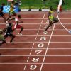 2008 год, Пекин, XXIX Олимпийские Игры, легкая атлетика: Usain Bolt (Ямайка) пересекает финишную линию в финальном забеге на 100 м с новым мировым рекордом - 9.69 сек.
