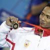 2008 год, Пекин, XXIX Олимпийские Игры, тяжелая атлетика: бронзовый призер соревнований в весовой категории 62 кг Triyatno A. (Индонезия). Фото-EPA/DENNIS M. SABANGAN