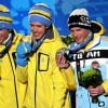 Ванкувер 2010, лыжные гонки: призёры в мужском скиатлоне 15 км + 15 км шведы Юхан Ольссон (бронза) и Маркус Хельнер (золото) и  немец Тобиас Ангерер (серебро). © 2010/GETTY